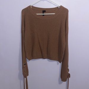 A brownish colored sweater